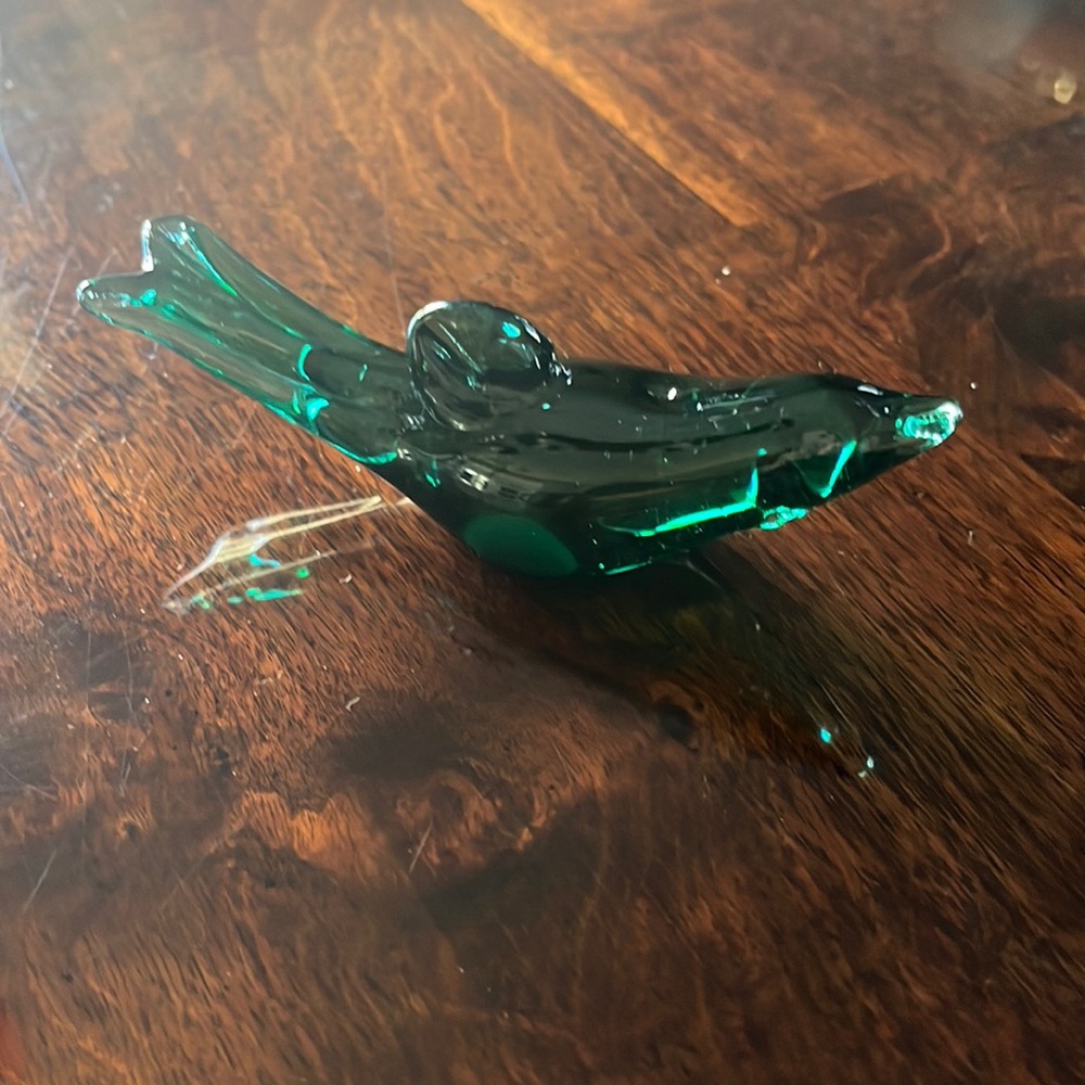 Vintage green glass dolphin a must have for your beach house.